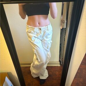 BDG jeans with tons of Y2K-inspired pockets at the legs.